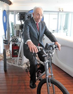 President Peres pedalling on the Google bike